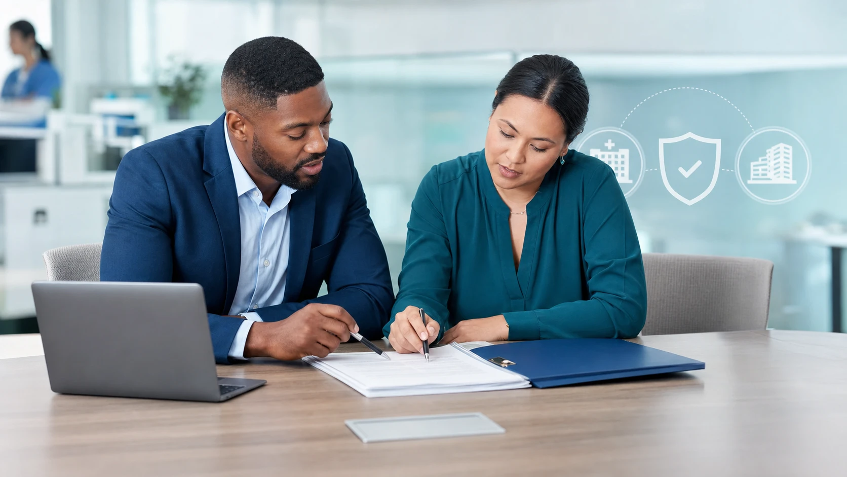 A man and woman in business attire review a document together with icons for healthcare and insurance nearby